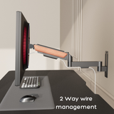 FlowArm Wall Mount in black — 2-way integrated cable management channel keeping monitor wires hidden