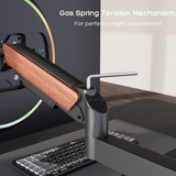 FlowArm Wall Mount in black — adjustable gas spring tension mechanism for perfect monitor weight balance